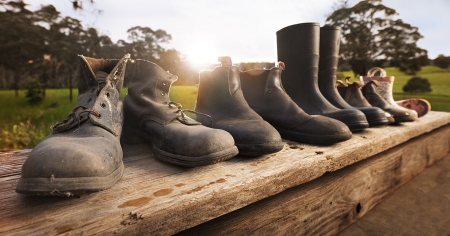 row of families boots of different sizes